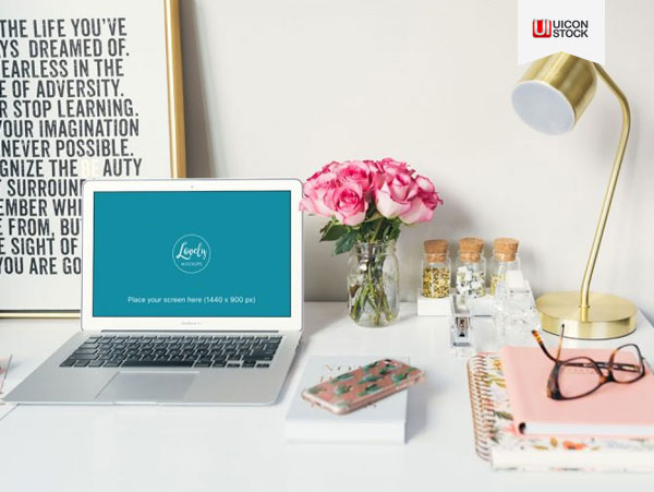 Free-Macbook-Air-With-Roses-On-A-Table-Mockup-2018