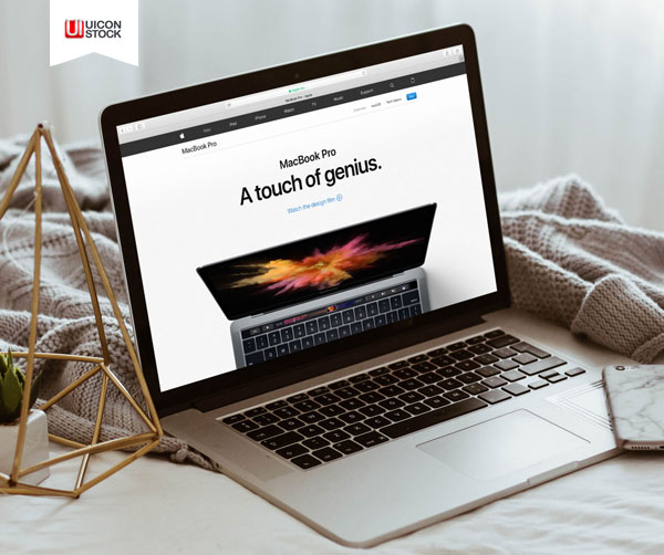 Free-Apple-Macbook-Pro-On-Bed-Mockup-2018