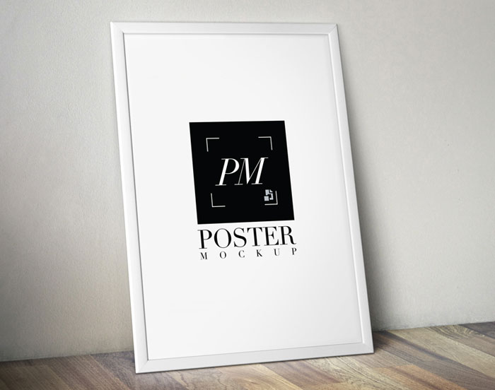 Poster-Frame-on-Wooden-Background-MockUp-PSD