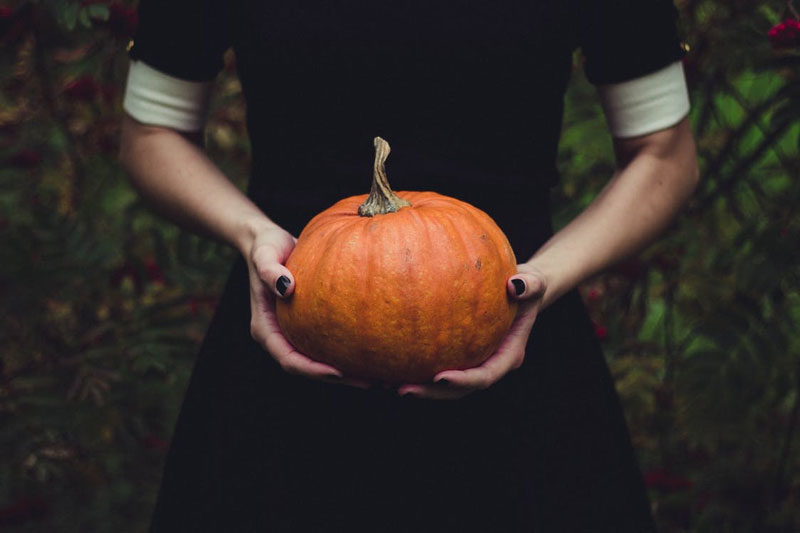 Girl-Holding-Squash-Fruit-in-Hands