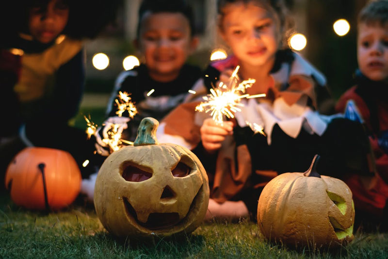 Outdoor-Children-Holding-Firecrackers-Halloween